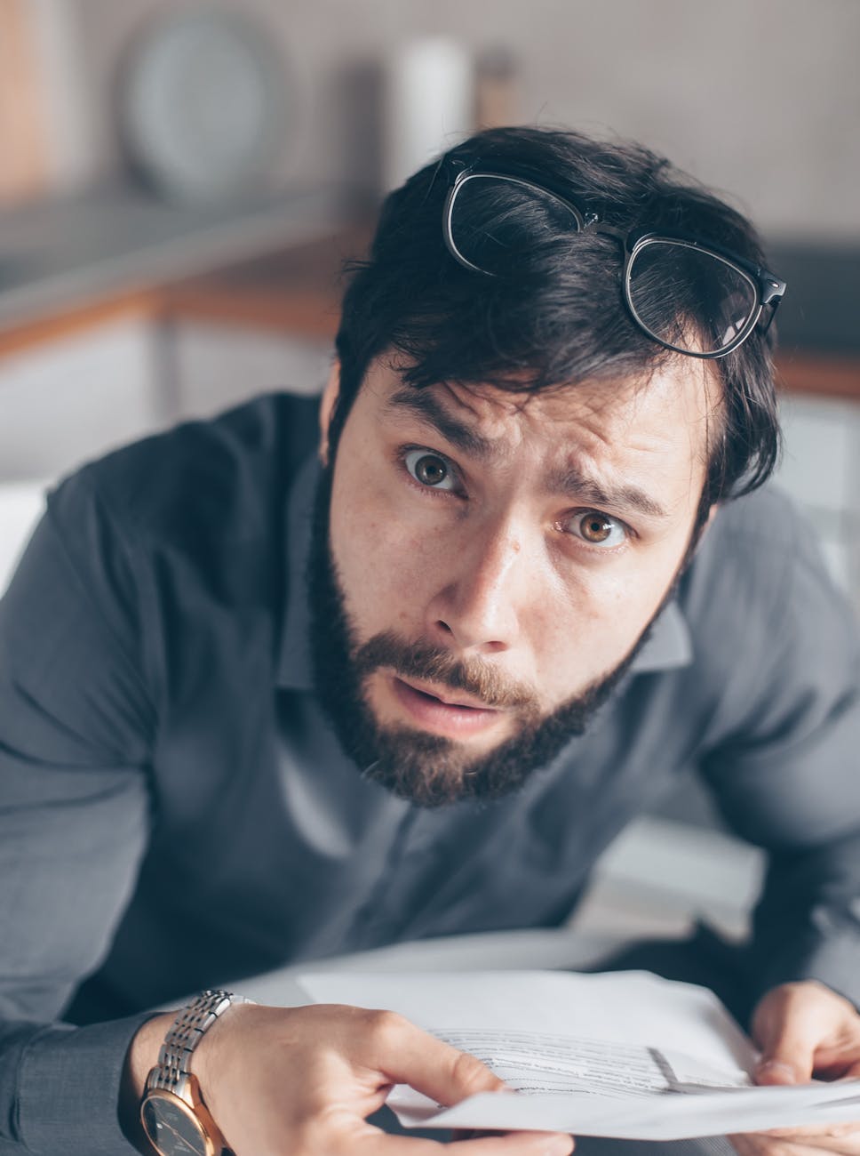 photo of bearded man feeling confused